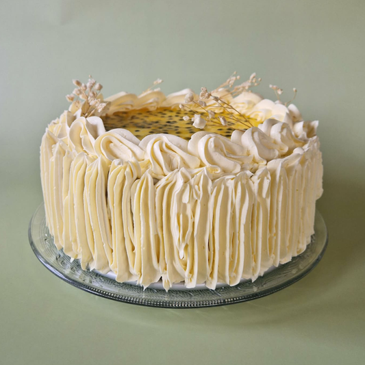 Passievrucht witte chocolade taart (8 pers)