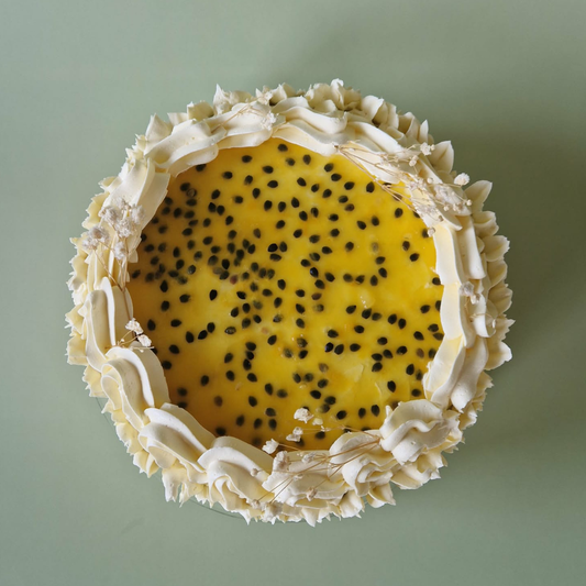 Passievrucht witte chocolade taart (8 pers)